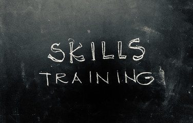 Skills Training Handwritten on Blackboard