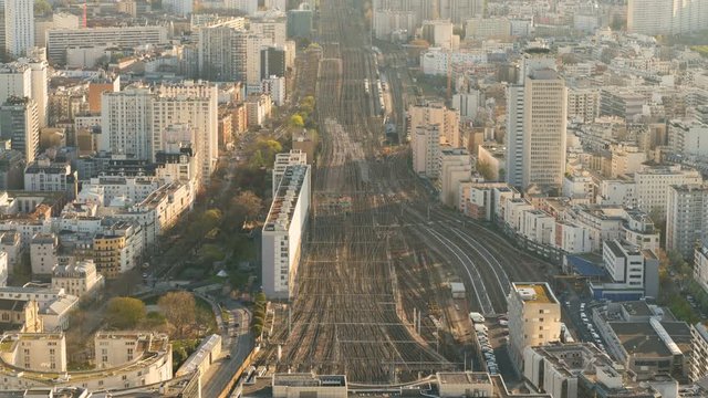 Top view of Paris skyline from above timelapse. Main landmarks of european megapolis with train station of Vaugirard-Belt. Bird-eye view from observation deck of Montparnasse tower