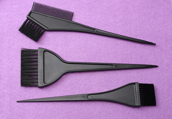 barbershop tools on pink felt background. top view