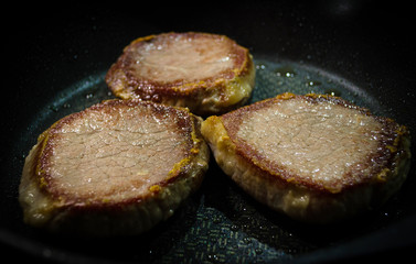 Roasted meat on the grill. closeup