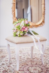 bridal bouquet on a chair