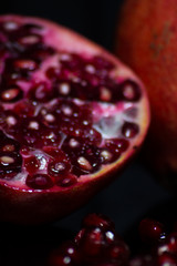 Delicious pomegranate seeds. Juicy Ripe Red Granets or Garnets.  Closeup view of Grain Red Grenades. 