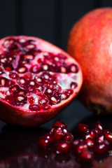 Delicious pomegranate seeds. Juicy Ripe Red Granets or Garnets.  Closeup view of Grain Red Grenades. 