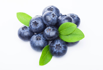 Fresh raw organic blueberries with leaf on white background. Macro close up