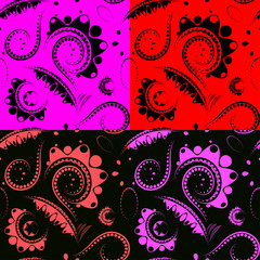 A set of bright shades of dark red and black carved flowers and petals.