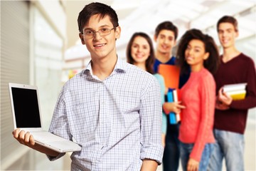 Group of Students with books isolated on light background