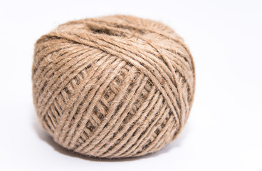 twine rope for knitting and decor on a white background