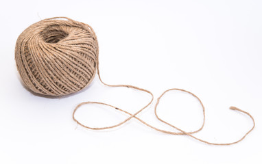 twine rope for knitting and decor on a white background