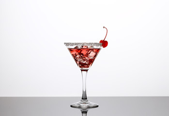Cocktail with ice and cherry