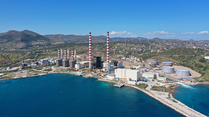 Aerial drone photo of industrial power plant by the sea in mediterranean destination