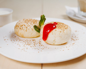 Breakfast, coffee, cereal, scrambled eggs, toast, bacon, nuts.