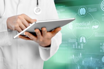 Close-up Doctor at hospital working with tablet pc