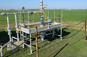 Obraz na płótnie Canvas The equipment and technologies on oil fields. Oil well
