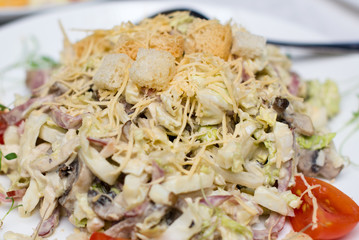 Tuna salad with lettuce, eggs and tomatoes.