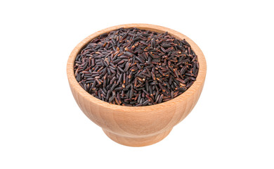 jasmine black rice in wooden bowl isolated on white background. nutrition. food ingredient.