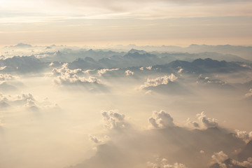 Fluffy white clouds, a view from airplane window