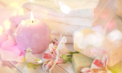 Fototapeta na wymiar Spa treatment health spa candle towel bar of soap orchid aromatherapy