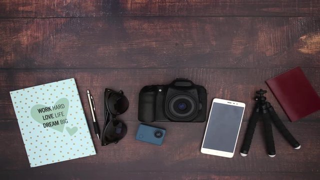 Travel kit camera telephone tripod notebook and sunglasses - Stop motion 