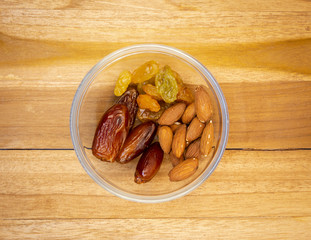 dates,raisins and almonds overhead macro photo