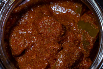 Indian spicy pickle jar macro close up