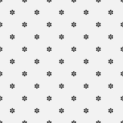 Seamless vector floral pattern. Minimal simple background with tiny flowers. Decorative stylish monochrome texture in black and white. Isolated repetitive flat tile design.