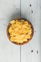 Rustic bowl of corn flakes