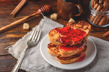 Stack of french toasts with berry marmalade