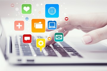 Businesswoman at work with laptop,close up