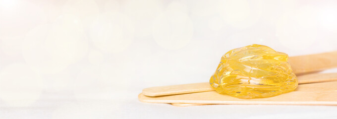 extra wide banner background with sugar paste or wax honey for hair removing and wooden waxing...