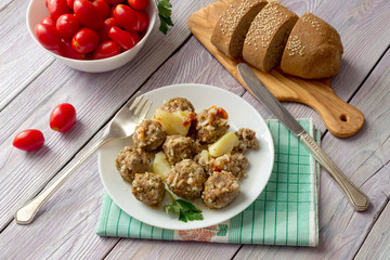 The meatballs with rice and vegetables