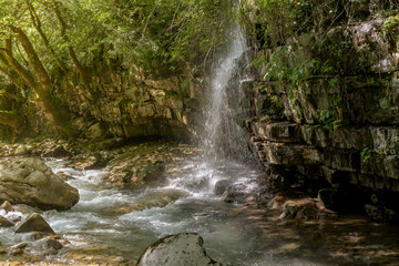 Naklejka premium Waterfall in the mountains (region Tzoumerka, Greece, mountains Pindos).