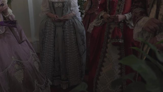 Medieval ball in Rundale palace with beautiful costumes for tourists - Old fashioned vintage style