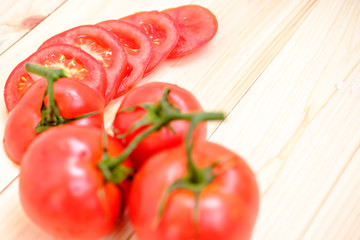 fresh tomato slice on wood background