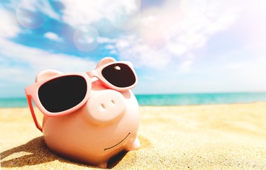 Piggy Bank Wearing Sunglasses Relaxing