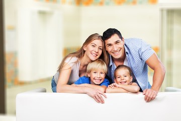 Fototapeta na wymiar Beautiful smiling family on background