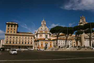ROME, ITALY - 11 SEPTEMBER 2018: The city of Rome with beautiful ancient stone buildings near the square, the Palazzo Venezia and the Vittoriano