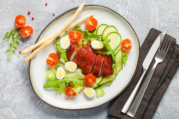 Chicken meat and vegetables salad.
