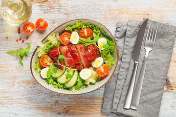 Chicken meat and vegetables salad.