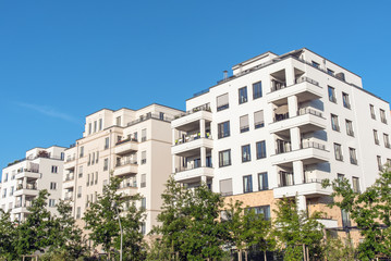 New white and beige apartment houses seen in Berlin, Germany