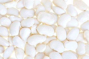 White beans on a white background. Texture of white beans.