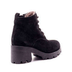 Beautiful high heel shoe on isolated white studio background. Fashion classic High heels. Pumps peep toe shoes in classic design. Sexy elegant stylish shoes. Black high heel.