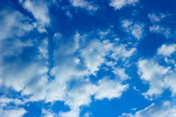 Obraz premium Blue Sky And White Clouds. Horizontal Shot Of A Beautiful Sky Background. Heaven, Nature Concept.