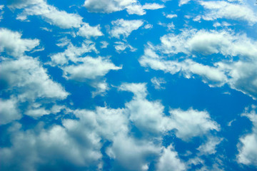 Obraz premium Blue Sky And White Clouds. Horizontal Shot Of A Beautiful Sky Background. Heaven, Nature Concept.