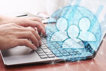 Using internet for communication and data exchanges. Global people network structure. Businessman communicating by laptop.