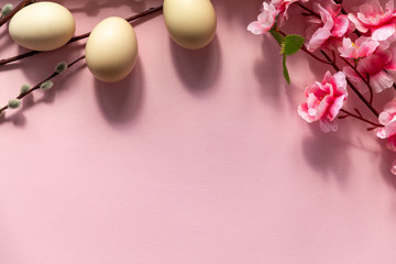 Easter background with Easter eggs on pink