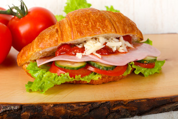 Croissat with ham and cheese