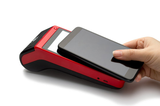 Customer paying contactless with smartphone on POS. Mobile smart wireless POS payment terminal. Closeup, isolated on white background. Concept for banking, finance and card payments.