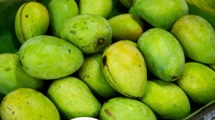 Fresh green mango in the basket 