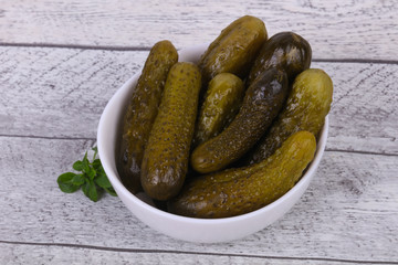 Pickled cucumbers heap in the bowl