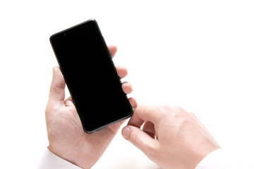 Unrecognizable man holding smartphone with black blank screen isolated on white background.
